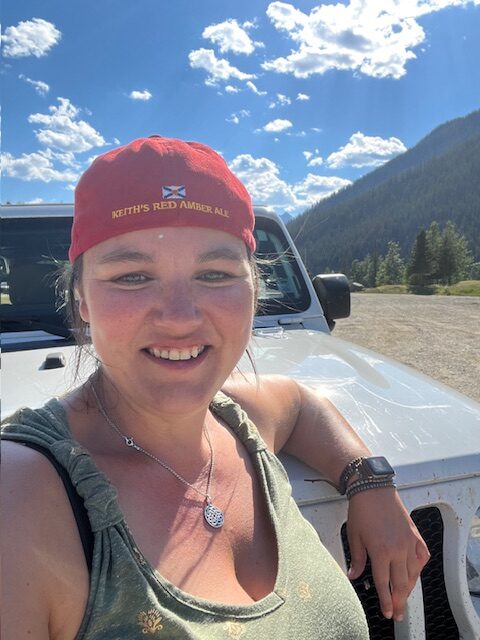 heather deveaux in field, british columbia, go anyway solo adventure course